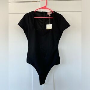 Show me your MuMu black zip up square neck bodysuit. NWT